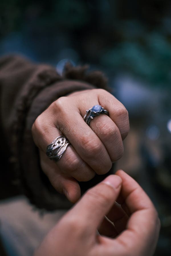 With a ring on his finger. stock photo. Image of nail 239199998