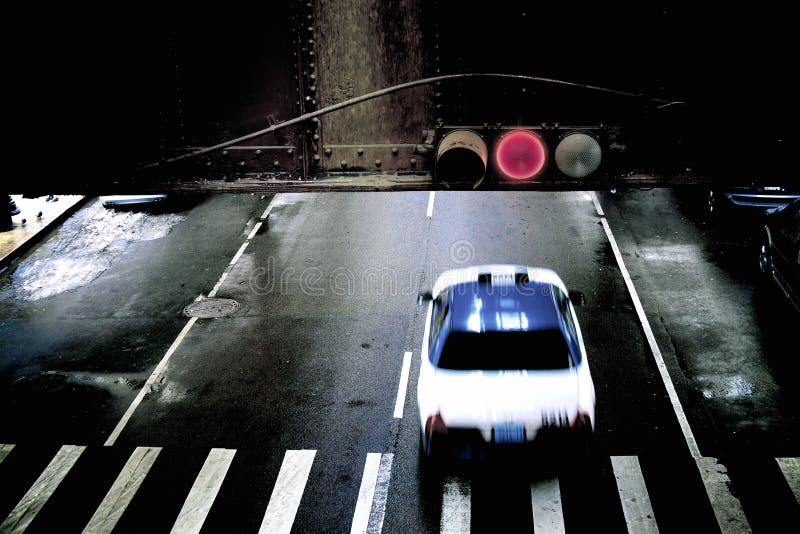 Rinnande rött ljus för taxi arkivbild Rinnande rött ljus för taxi arkivbild
