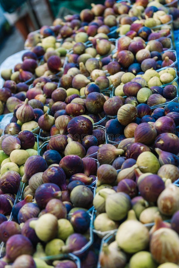 Ripe figs in boxes for sale in the market stock image