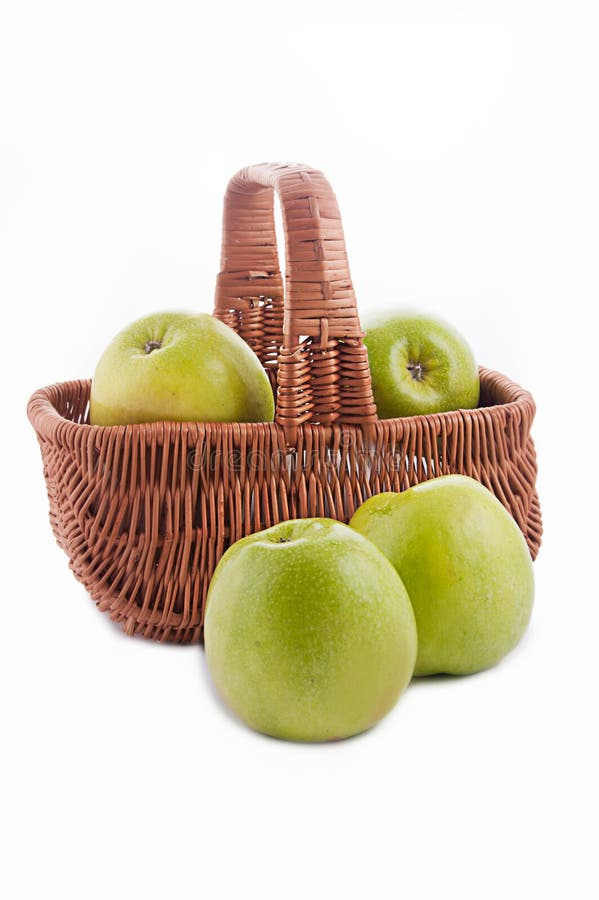 Ripe green apple in basket