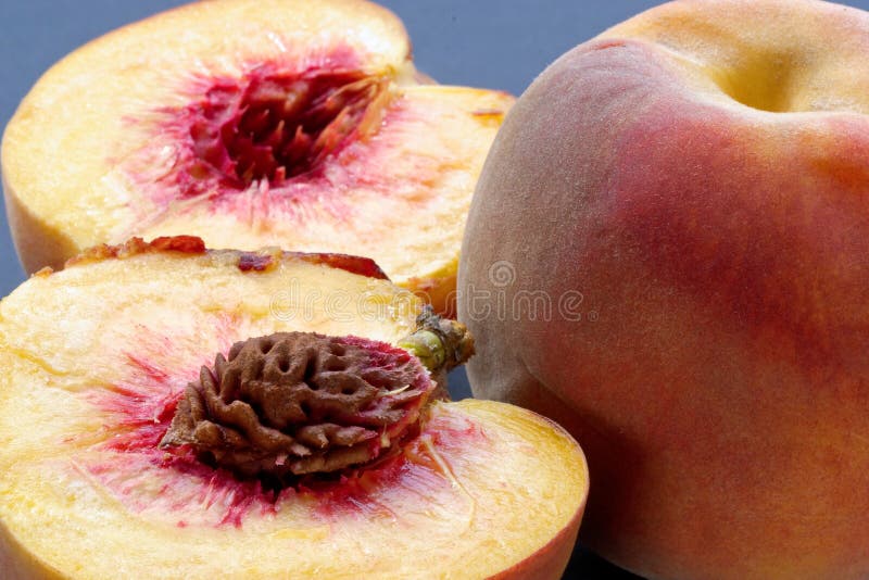Ripe juicy fleshy peaches