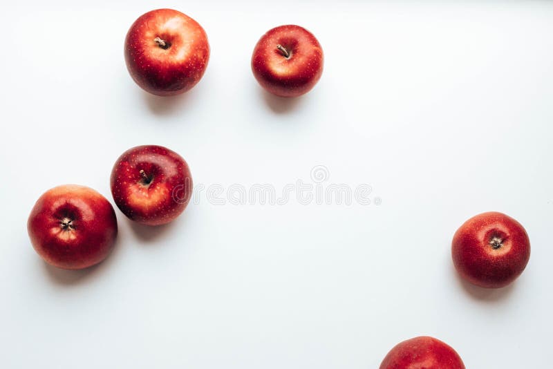 Ripe juicy red rayal gala apples on grey backgroung. Top view. Autumn composition. Ripe juicy red rayal gala apples on grey backgroung. Top view. Autumn composition.