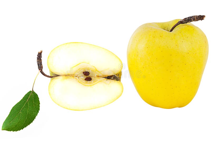 Ripe, juicy, sweet, yellow apple with a green leaf