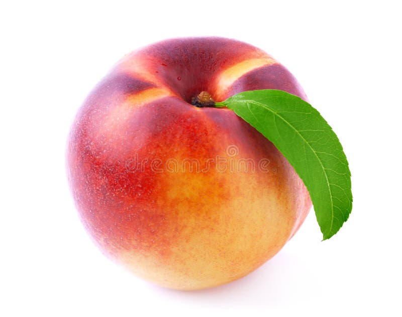 Ripe peach with leaf.