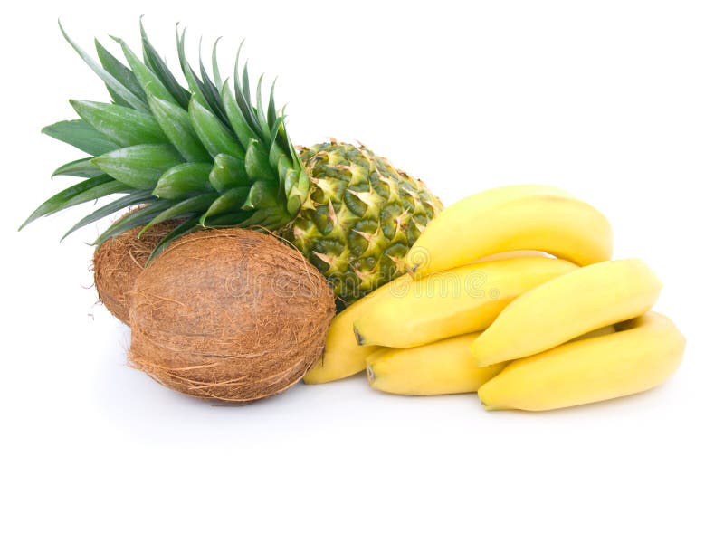 Ripe pineapple, bunch of bananas and coconut