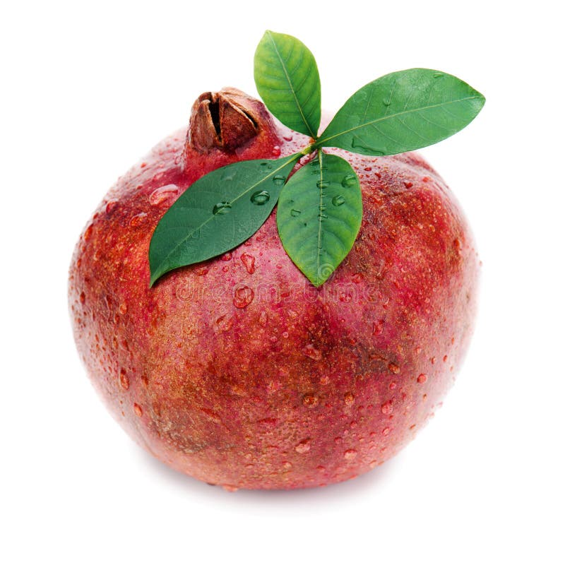 Ripe pomegranate fruit with green leaves isolated on white background. Closeup.