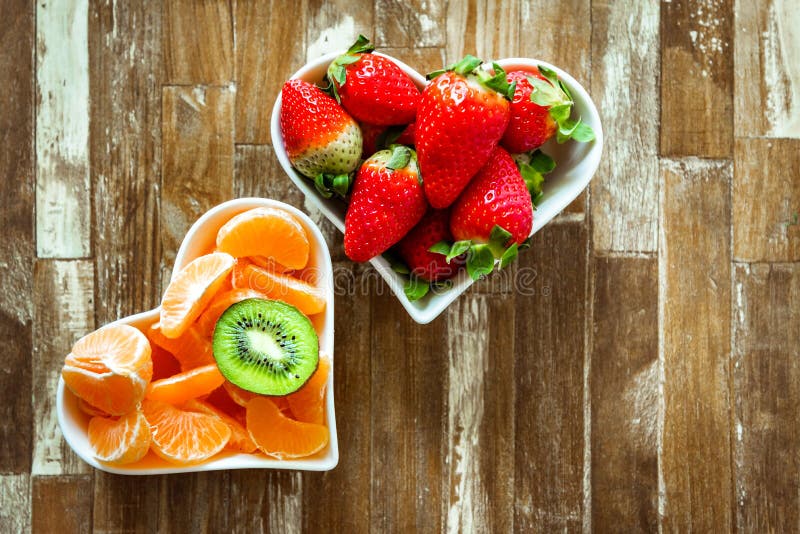 Ripe strawberries and tangerine slices royalty free stock images Ripe strawberries and tangerine slices royalty free stock images