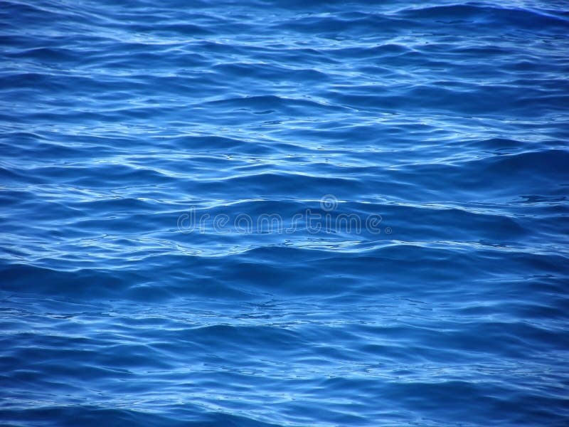 Riples, waves on blue sea