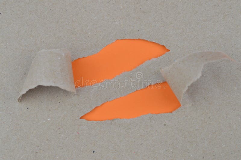 Ripped paper revealing two orange blank spaces for words conceptional for things that you can discover behind the scene. Ripped paper revealing two orange blank spaces for words conceptional for things that you can discover behind the scene