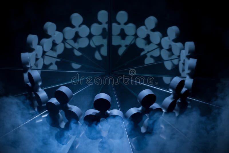 Ripple Crypto Currency Symbol Covered in Dark Winter Fog stock photo Ripple Crypto Currency Symbol Covered in Dark Winter Fog stock photo