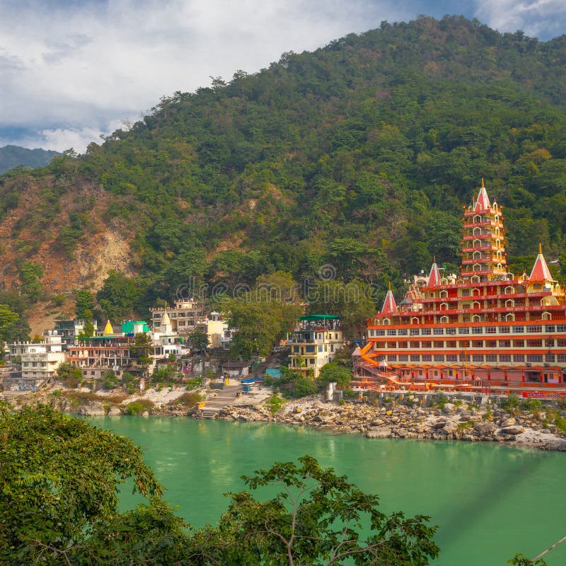 View of Ganga river embankment, Lakshman Jhula bridge and Tera Manzil Temple, Trimbakeshwar in Rishikesh