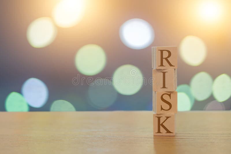 Risk Message on 4 Wooden Cubes on a Beautiful Bokeh Background Stock ...