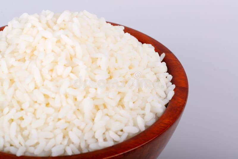 Riso bianco in una ciotola immagini stock libere da diritti Riso bianco in una ciotola immagini stock libere da diritti