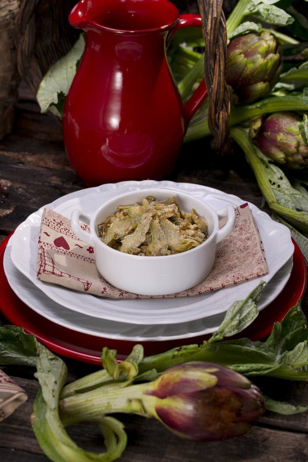 The first dish of rice with artichokes. The first dish of rice with artichokes