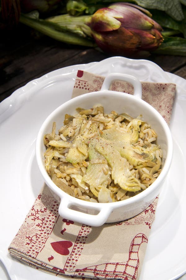 The first dish of rice with artichokes. The first dish of rice with artichokes