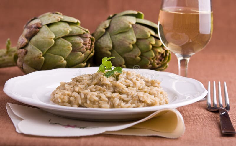 Closeup of risotto with artichokes.