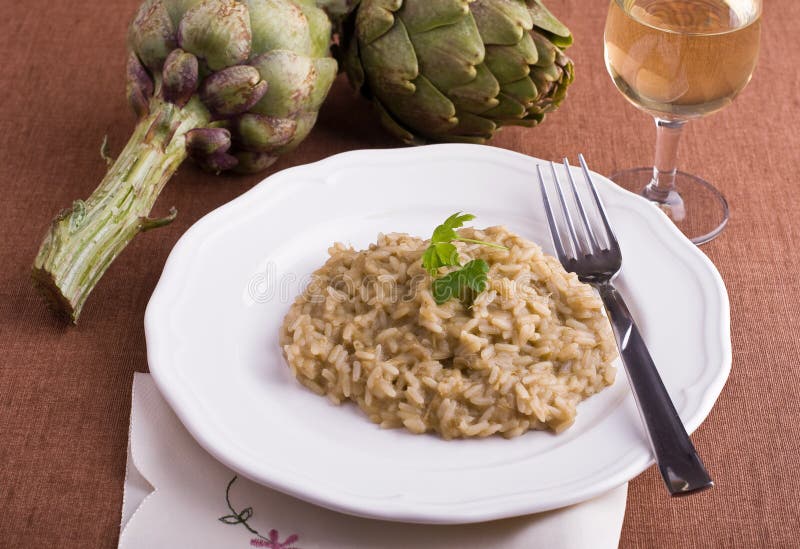 Image with risotto with artichokes.