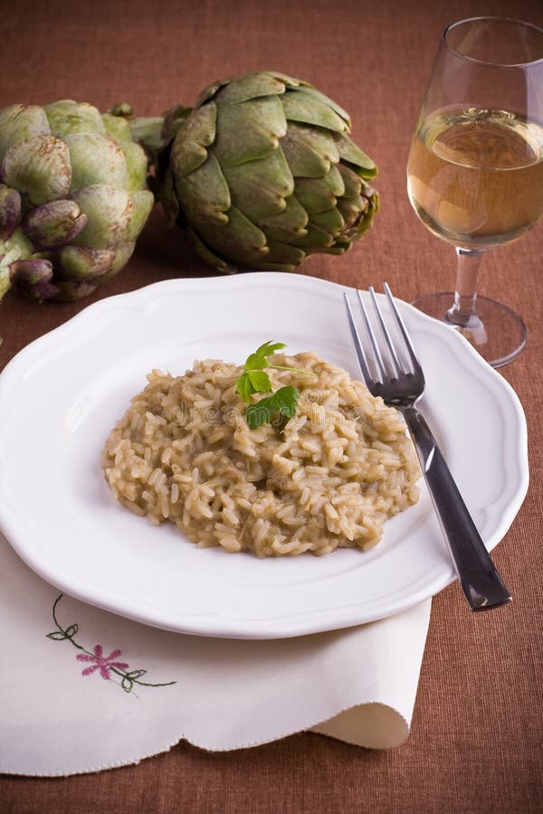 Closeup of risotto with artichokes.