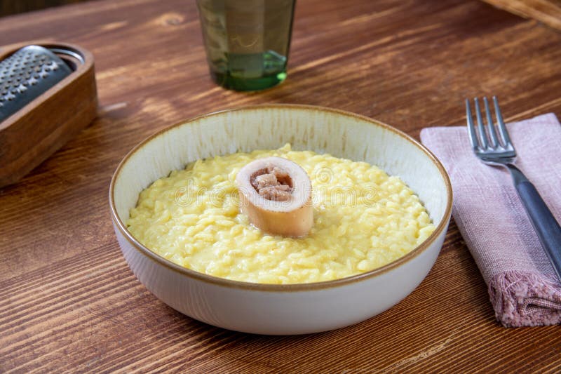 Risotto Milanese with Bone Marrow Stock Photo Image of dish, baking