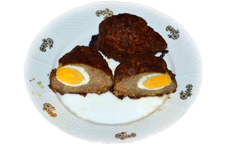 Rissole με το βρασμένο αυγό μέσα βρώμικο πιάτο στοκ εικόνες Rissole με το βρασμένο αυγό μέσα βρώμικο πιάτο στοκ εικόνες