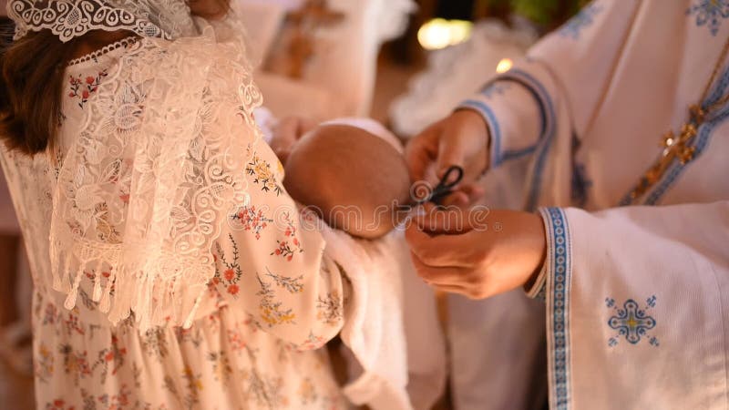 Rite of sacrament of epiphany child baby in church