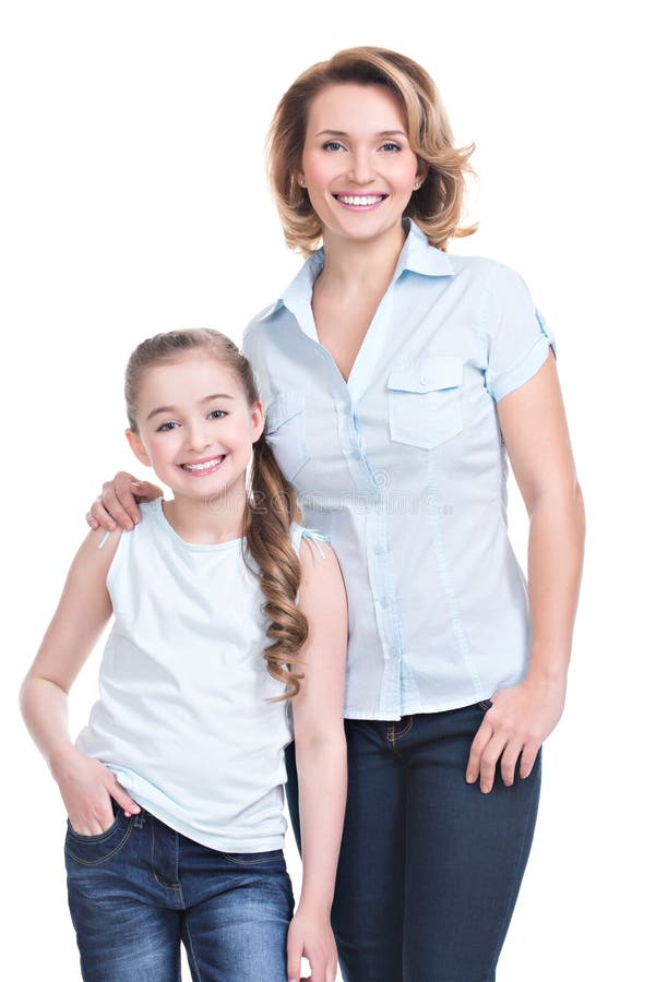 Ritratto completo della madre felice e di giovane figlia fotografia stock