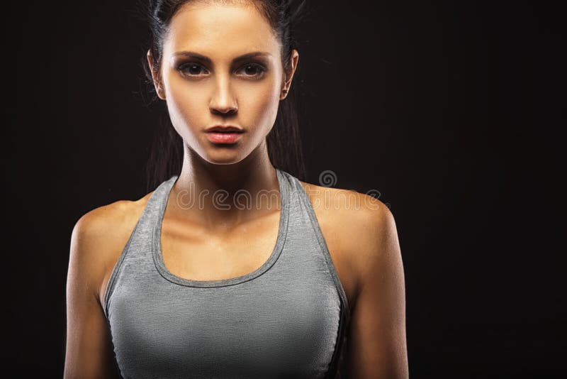 Ritratto del primo piano della donna sportiva fotografia stock Ritratto del primo piano della donna sportiva fotografia stock