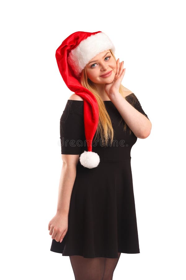 Ritratto di bella giovane donna bionda che porta un cappello di Santa, isolato su fondo bianco fotografie stock Ritratto di bella giovane donna bionda che porta un cappello di Santa, isolato su fondo bianco fotografie stock