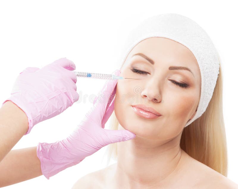 Ritratto di giovane donna su una procedura del botox immagine stock Ritratto di giovane donna su una procedura del botox immagine stock