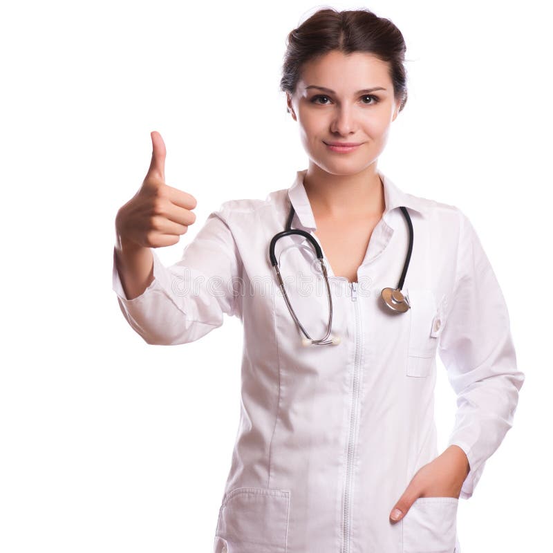 Ritratto di giovane medico femminile sorridente felice che mostra insegna in bianco, con il gesto giusto, isolato sopra bianco immagini stock Ritratto di giovane medico femminile sorridente felice che mostra insegna in bianco, con il gesto giusto, isolato sopra bianco immagini stock