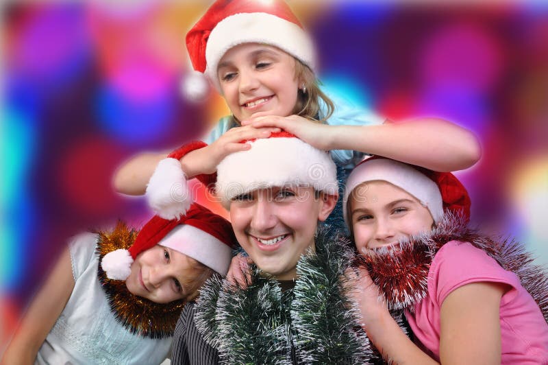 Ritratto di Natale dei bambini felici immagini stock Ritratto di Natale dei bambini felici immagini stock