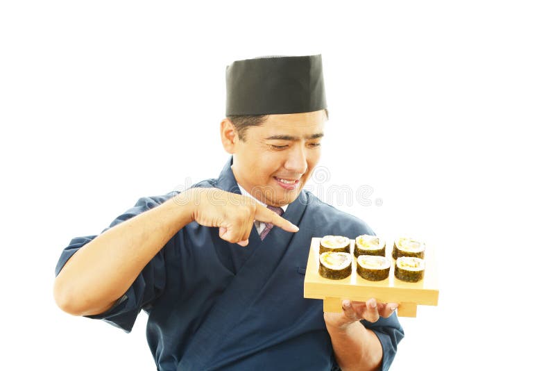 Ritratto di un cuoco unico di sushi immagini stock libere da diritti