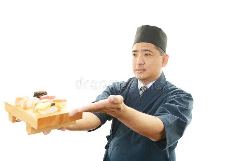 Ritratto di un cuoco unico di sushi fotografia stock libera da diritti