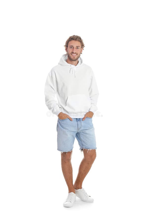 Ritratto integrale dell'uomo in maglione di maglia con cappuccio su fondo bianco immagini stock Ritratto integrale dell'uomo in maglione di maglia con cappuccio su fondo bianco immagini stock