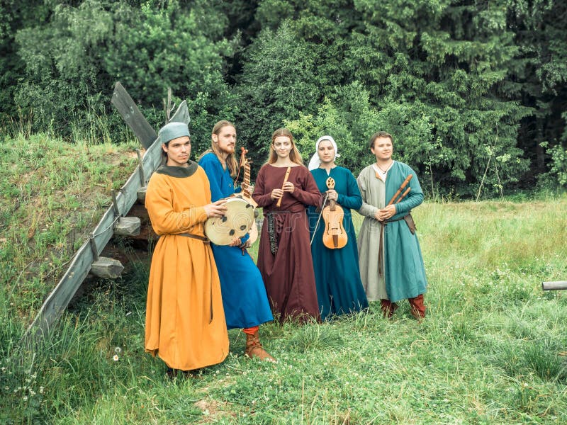 RITTER WEG, RUSSIA, MOROZOVO, APRIL 2017: Medieval musicians outdoor play music instruments medieval festival. RITTER WEG, RUSSIA, MOROZOVO, APRIL 2017: Medieval musicians outdoor play music instruments medieval festival