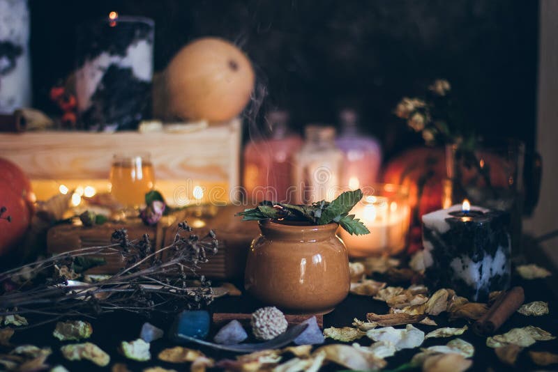 A Ritual Halloween Scene With Candles, Herbs, Spider Web, Vintage ...