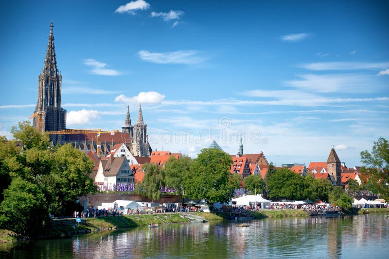 River Danube and Ulm skyline with Ulmer Minster (cathedral) against blue sky. River Danube and Ulm skyline with Ulmer Minster (cathedral) against blue sky