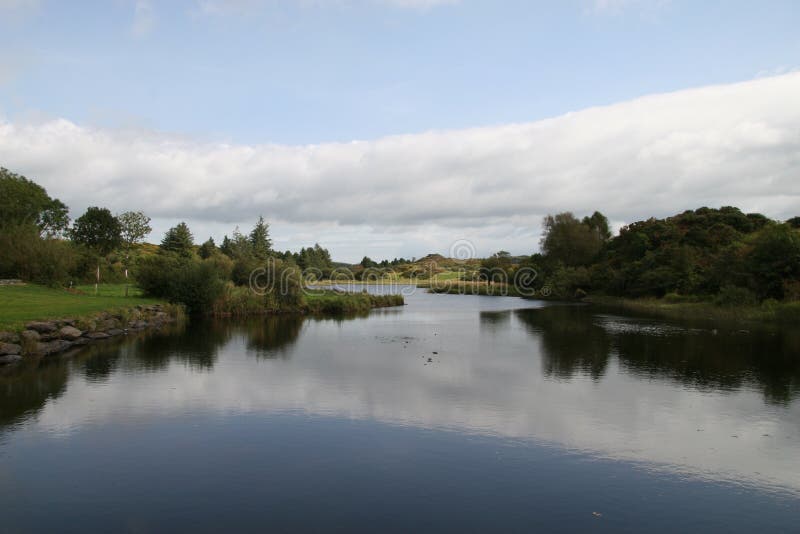 River in ireland stock photo. Image of clouds, blue, water 5653098