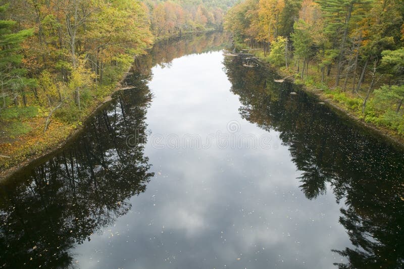 River runs through autumn color of western Massachusetts, New England