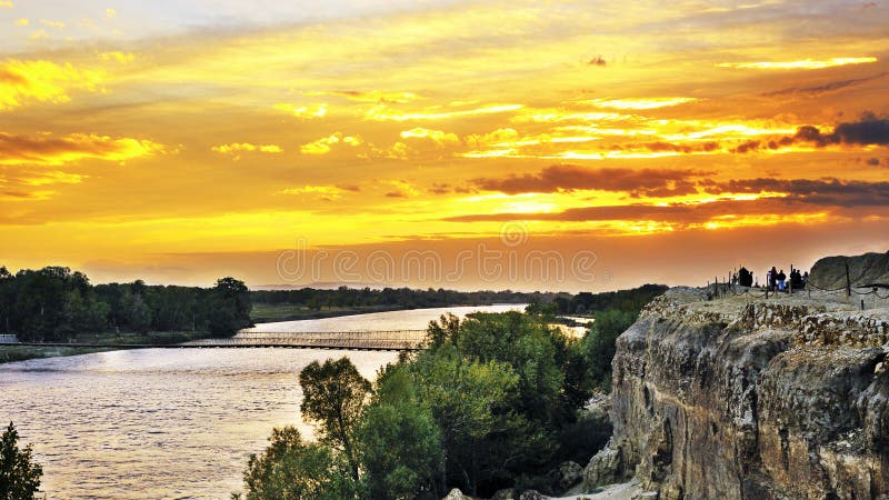 Sunset rays over a meandering river with woods and yadan earth surface at the riversides. it is HDR picture. Hdr bridge stock images, royalty-free photos and pictures