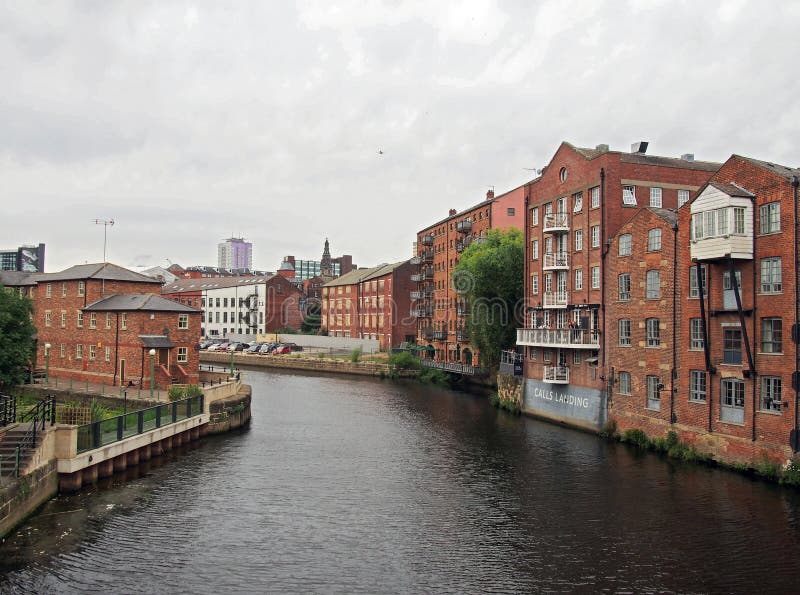 Riverside view of the calls landing area of leeds with waterfront apartments and buildings reflected in the river aire. Leeds, west yorkshire, united kingdom - 4 stock photo Riverside view of the calls landing area of leeds with waterfront apartments and buildings reflected in the river aire. Leeds, west yorkshire, united kingdom - 4 stock photo