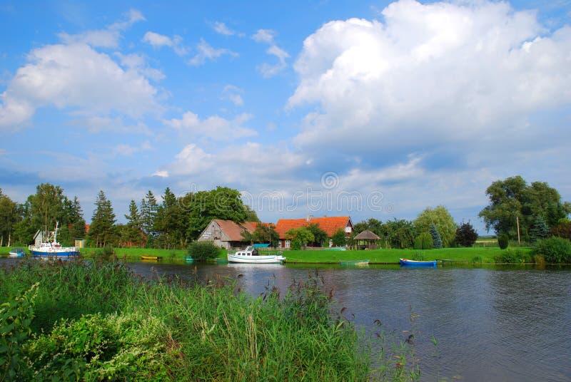 Riverside village stock photo. Image of forest, blue 19986978