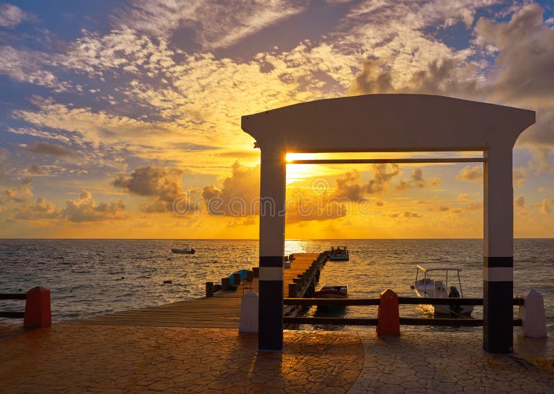 Riviera Maya sunrise pier Caribbean Mexico