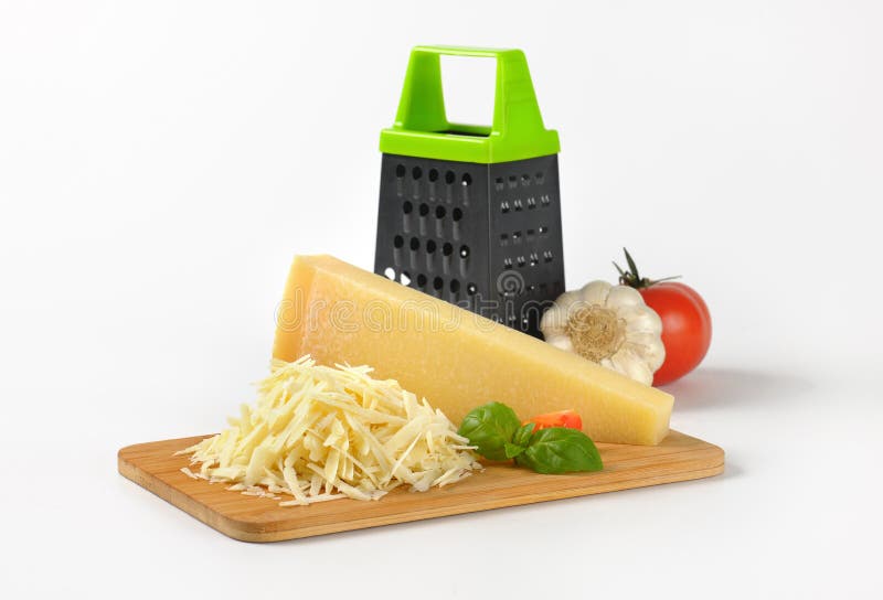 Rivjärn och parmesanost arkivfoto