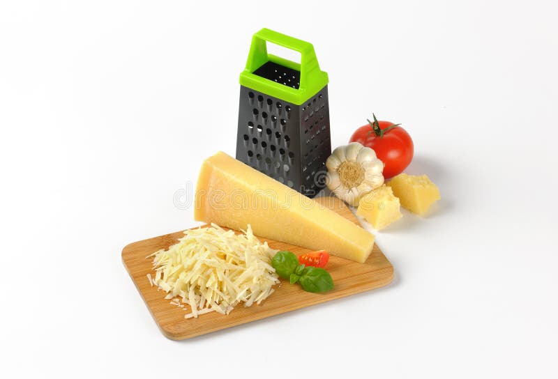 Rivjärn och parmesanost arkivfoton