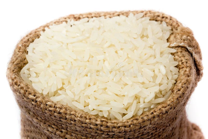 White long rice in small burlap sack. White long rice in small burlap sack