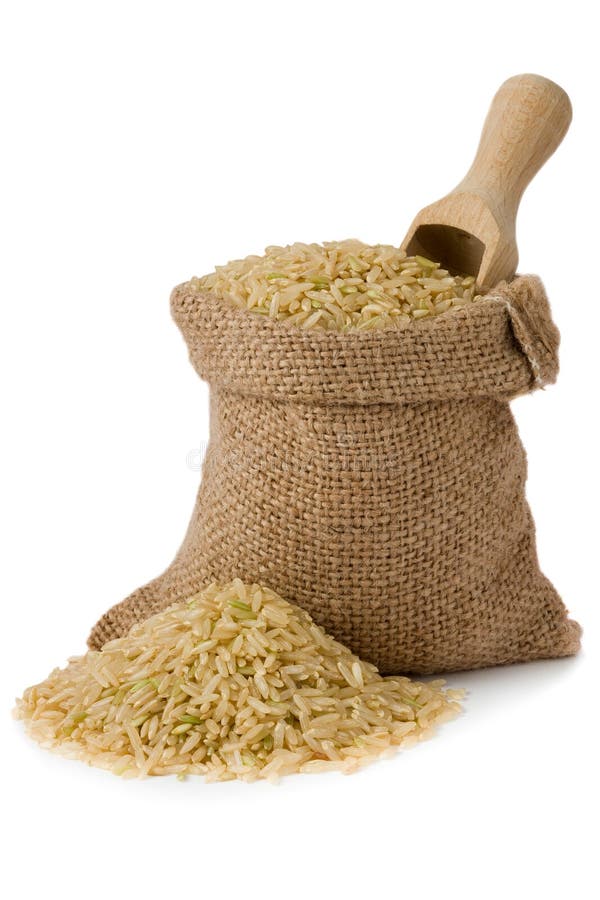 Brown natural long rice in small burlap sack. Brown natural long rice in small burlap sack