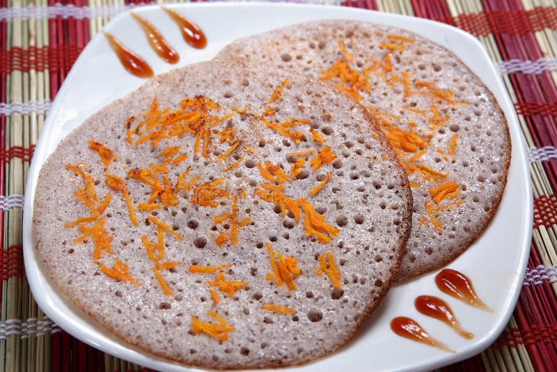 Riz noir Kavuni Uthappam délicieux images stock Riz noir Kavuni Uthappam délicieux images stock