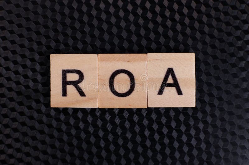 ROA Return On Assets from wooden letters on a black background. Letters roa stock images, royalty-free photos and pictures