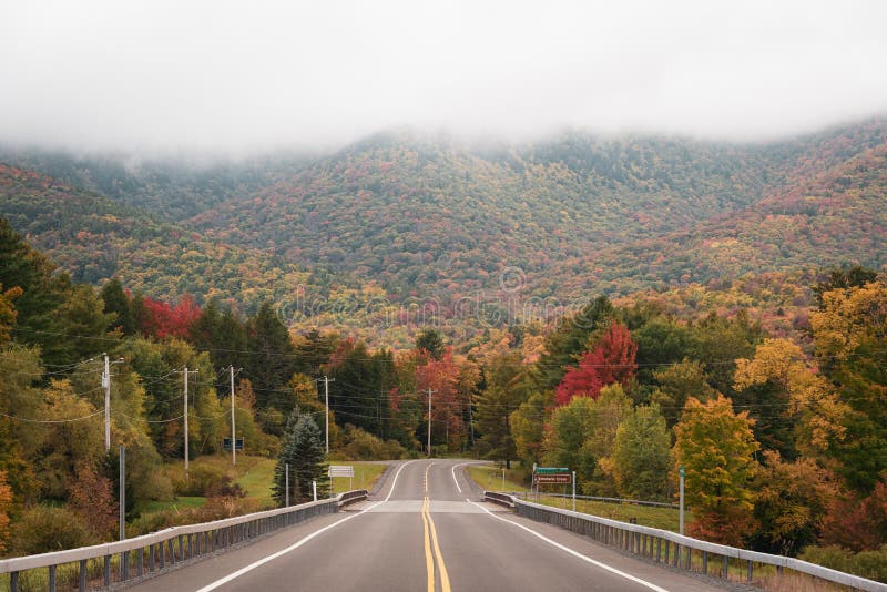 Road with autumn foliage, in the Catskill Mountains, New York stock photo